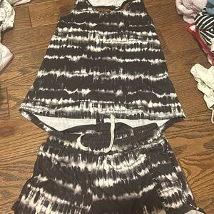 This is a two piece (a top and matching shorts) Athletic wear for 7-8 year olds